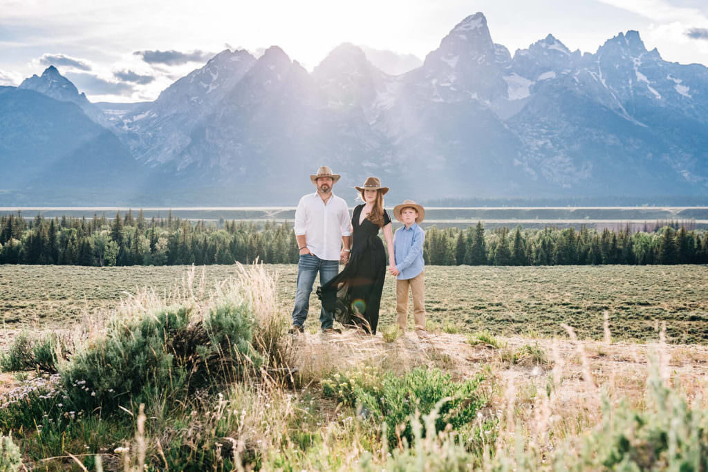 amily portrait by mountains Grand Tetons